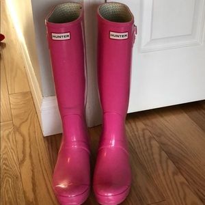 Tall pink hunter boots